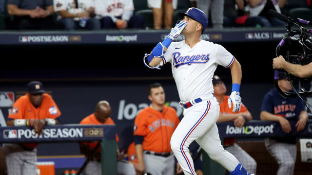 Oct 20, 2023; Arlington, Texas, USA; Texas Rangers first baseman Nathaniel Lowe (30) celebrates after hitting a solo home run during the fifth inning of game five in the ALCS against the Houston Astros for the 2023 MLB playoffs at Globe Life Field. Mandatory Credit: Kevin Jairaj-USA TODAY Sports